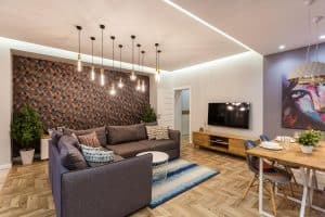 Iluminação para casa em sala de estar com luminárias. 