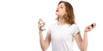 front view young lady white t shirt using black perfume tube white